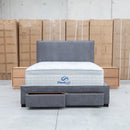 The Talia Queen Fabric Storage Bed - Storm available to purchase from Warehouse Furniture Clearance at our next sale event.
