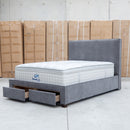 The Talia Queen Fabric Storage Bed - Storm available to purchase from Warehouse Furniture Clearance at our next sale event.