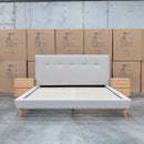 The Tara King Upholstered Bed - Oatmeal available to purchase from Warehouse Furniture Clearance at our next sale event.