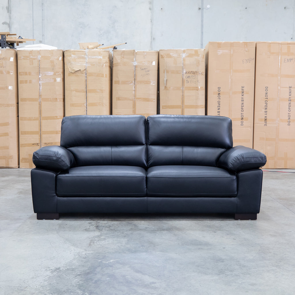 The Tayla Leather Three Seat Sofa - Black available to purchase from Warehouse Furniture Clearance at our next sale event.