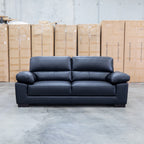 The Tayla Leather Three Seat Sofa - Black available to purchase from Warehouse Furniture Clearance at our next sale event.
