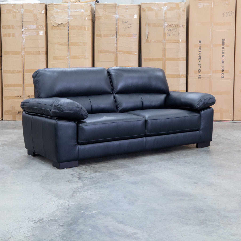The Tayla Leather Three Seat Sofa - Black available to purchase from Warehouse Furniture Clearance at our next sale event.