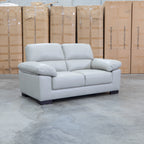 The Tayla Leather Two Seat Sofa - Light Grey available to purchase from Warehouse Furniture Clearance at our next sale event.