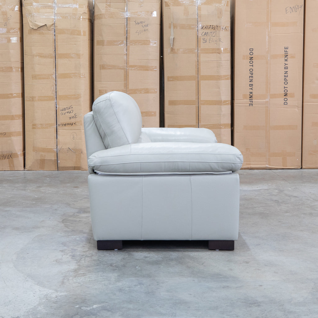 The Tayla Leather Three Seat Sofa - Light Grey available to purchase from Warehouse Furniture Clearance at our next sale event.