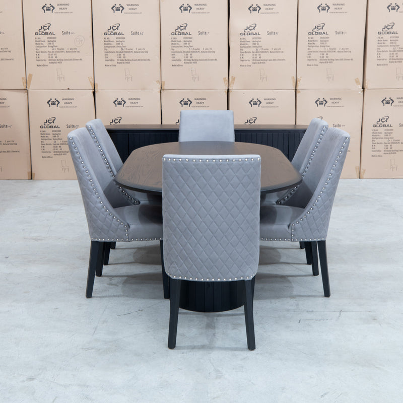 The Semillon 210cm New Zealand Ash Oval Dining Table - Black available to purchase from Warehouse Furniture Clearance at our next sale event.