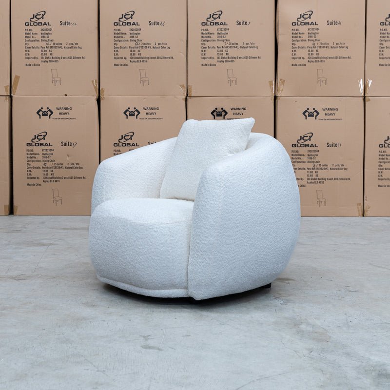 The Trenton Curved Boucle Armchair - Ivory available to purchase from Warehouse Furniture Clearance at our next sale event.