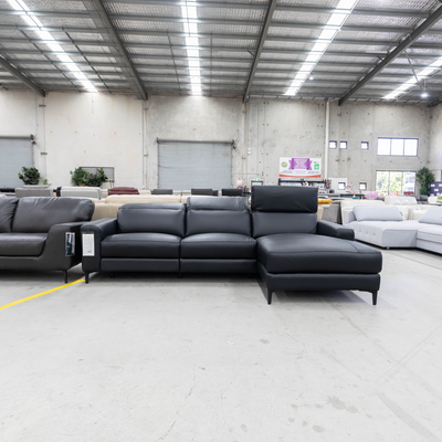 The La-Z-Boy Phoenix Powered RHF Chaise Lounge - Milan Jet - Floor Stock available to purchase from Warehouse Furniture Clearance at our next sale event.