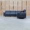 The Urban Electric Leather Corner Recliner Lounge - Black available to purchase from Warehouse Furniture Clearance at our next sale event.