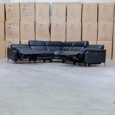 The Urban Electric Leather Corner Recliner Lounge - Black available to purchase from Warehouse Furniture Clearance at our next sale event.