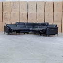 The Urban Electric Leather Corner Recliner Lounge - Black available to purchase from Warehouse Furniture Clearance at our next sale event.