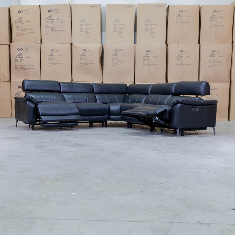 The Urban Electric Leather Corner Recliner Lounge - Black available to purchase from Warehouse Furniture Clearance at our next sale event.