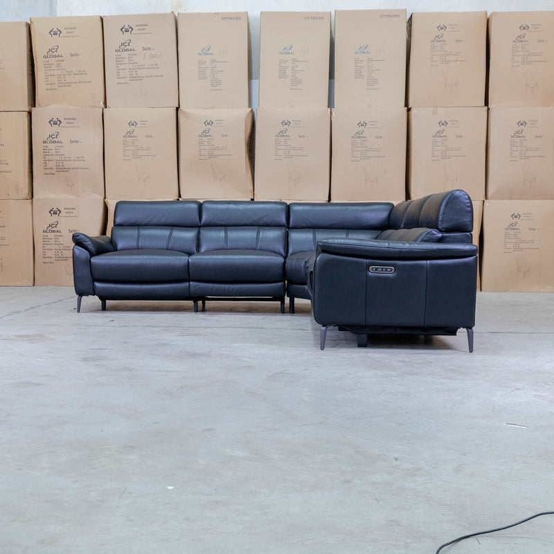 The Urban Electric Leather Corner Recliner Lounge - Black available to purchase from Warehouse Furniture Clearance at our next sale event.