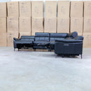 The Urban Electric Leather Corner Recliner Lounge - Black available to purchase from Warehouse Furniture Clearance at our next sale event.