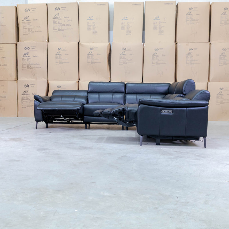 The Urban Electric Leather Corner Recliner Lounge - Black available to purchase from Warehouse Furniture Clearance at our next sale event.