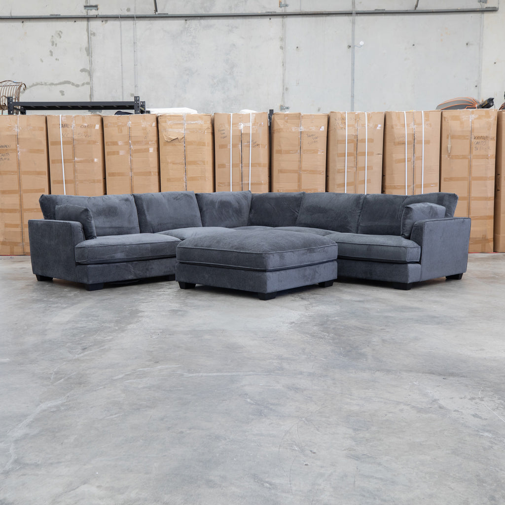 The Veloura Deep Seat Feather & Foam Corner Suite with Ottoman - Carbon available to purchase from Warehouse Furniture Clearance at our next sale event.