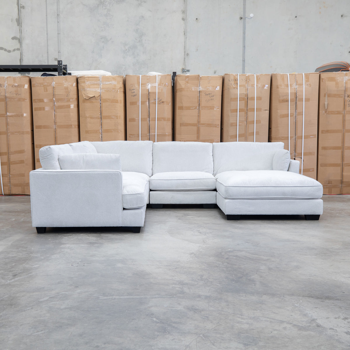 The Veloura Deep Seat Feather & Foam Corner Suite with Ottoman - Oat available to purchase from Warehouse Furniture Clearance at our next sale event.