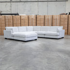 The Veloura Deep Seat Feather & Foam Corner Suite with Ottoman - Oat available to purchase from Warehouse Furniture Clearance at our next sale event.