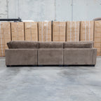 The Veloura Feather & Foam Corner Suite with Ottoman - Leeds Chocolate available to purchase from Warehouse Furniture Clearance at our next sale event.