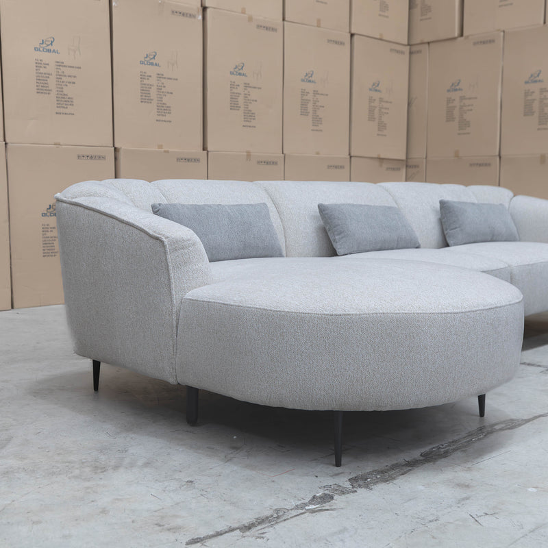The West Curved LHF Chaise Lounge - Cloud available to purchase from Warehouse Furniture Clearance at our next sale event.