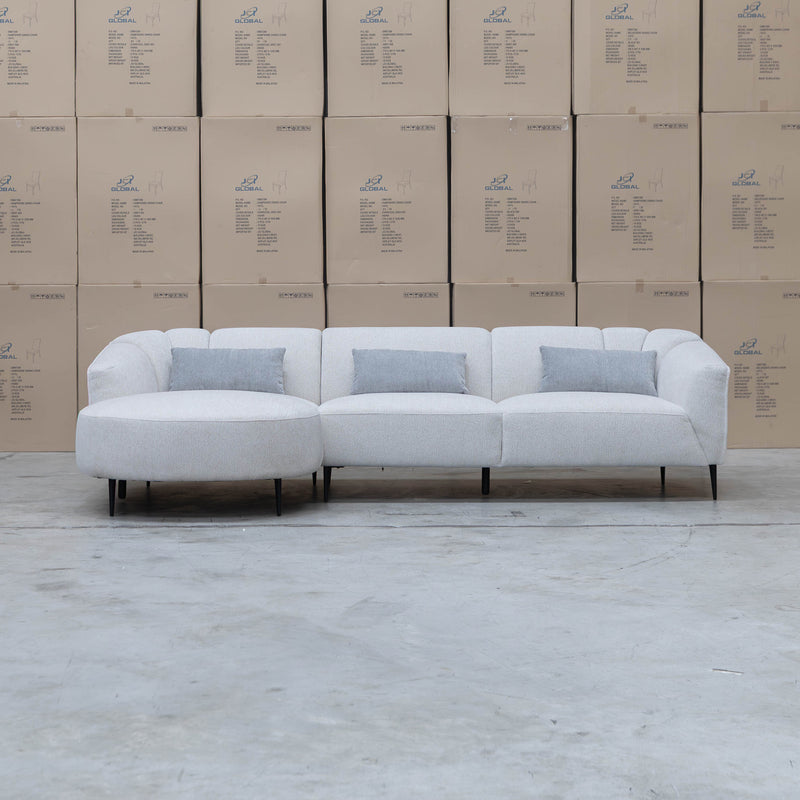 The West Curved LHF Chaise Lounge - Cloud available to purchase from Warehouse Furniture Clearance at our next sale event.