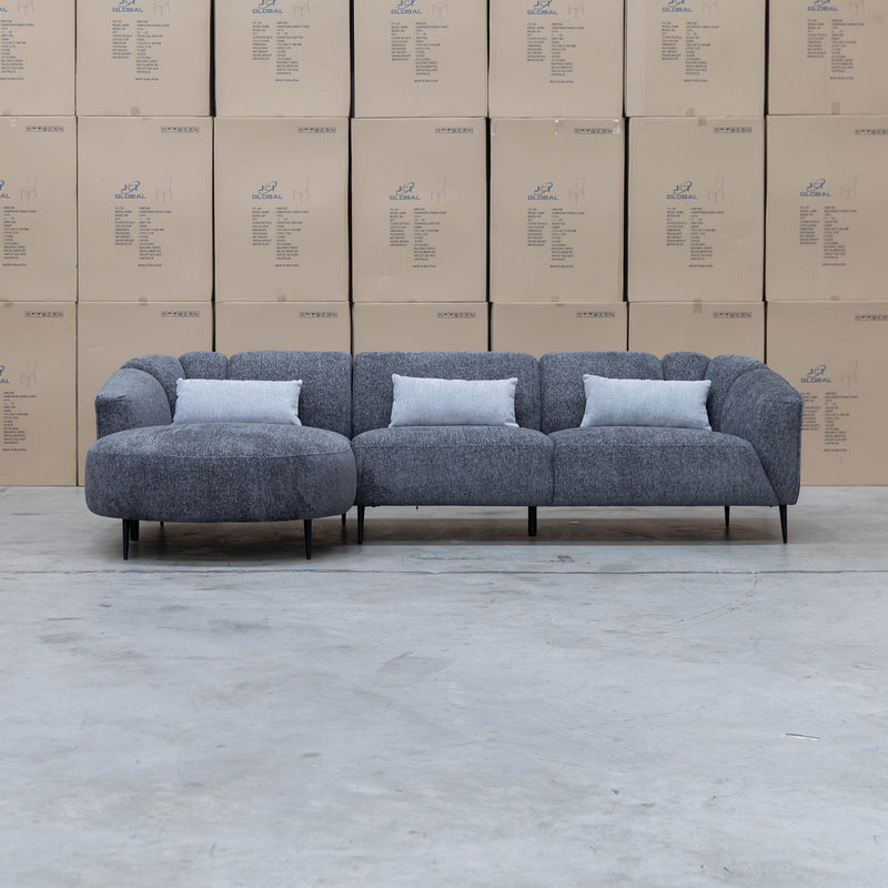 The West Curved LHF Chaise Lounge - Charcoal available to purchase from Warehouse Furniture Clearance at our next sale event.