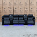 The Xanadu 4 Recliner Dual Motor Electric Theatre Lounge - Black Leather - Available After 6th November available to purchase from Warehouse Furniture Clearance at our next sale event.