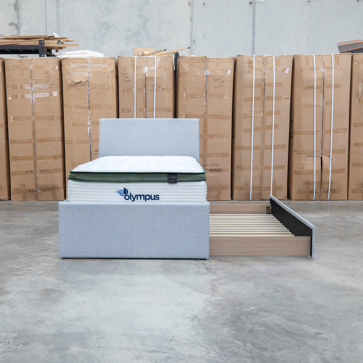 The York King Single Fabric Trundle Bed - Grey (Reversible Trundle) available to purchase from Warehouse Furniture Clearance at our next sale event.