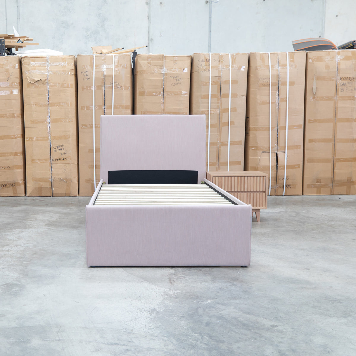The York King Single Fabric Trundle Bed - Pink (Reversible Trundle) available to purchase from Warehouse Furniture Clearance at our next sale event.