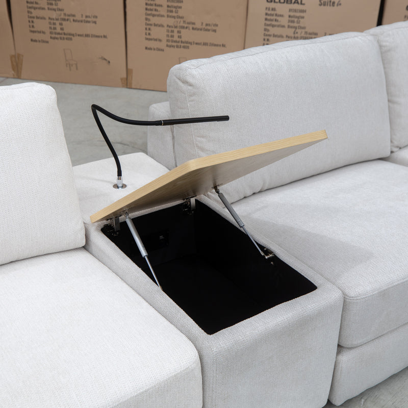 The Zenith Modular Reversible Chaise Lounge With Bookshelf - Oat White available to purchase from Warehouse Furniture Clearance at our next sale event.