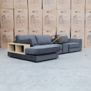 The Zenith Modular Reversible Chaise Lounge With Bookshelf - Shadow available to purchase from Warehouse Furniture Clearance at our next sale event.