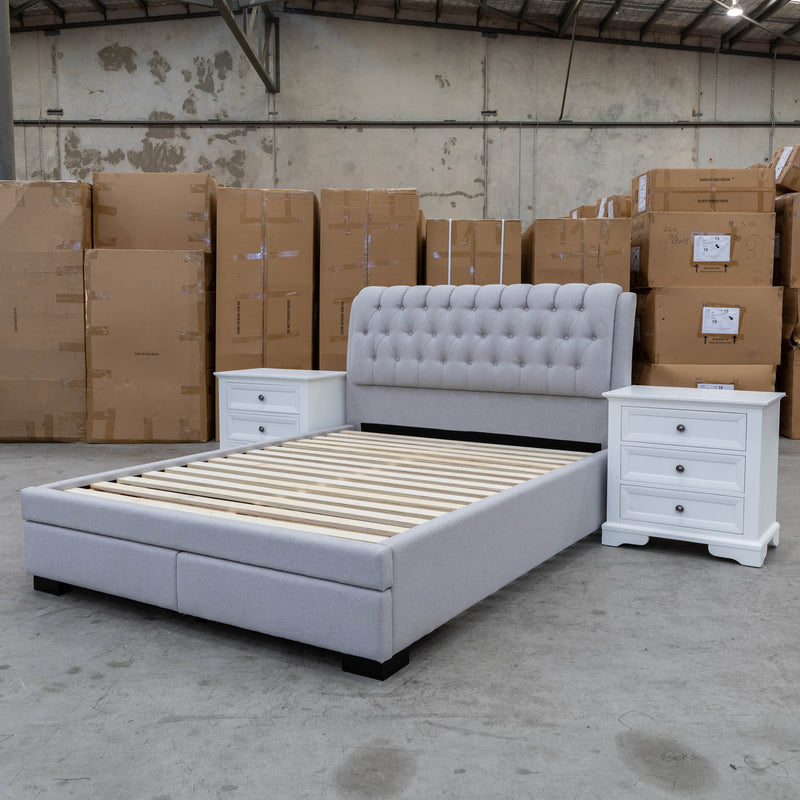 The Barslow Queen Fabric Storage Bed - Light Grey available to purchase from Warehouse Furniture Clearance at our next sale event.