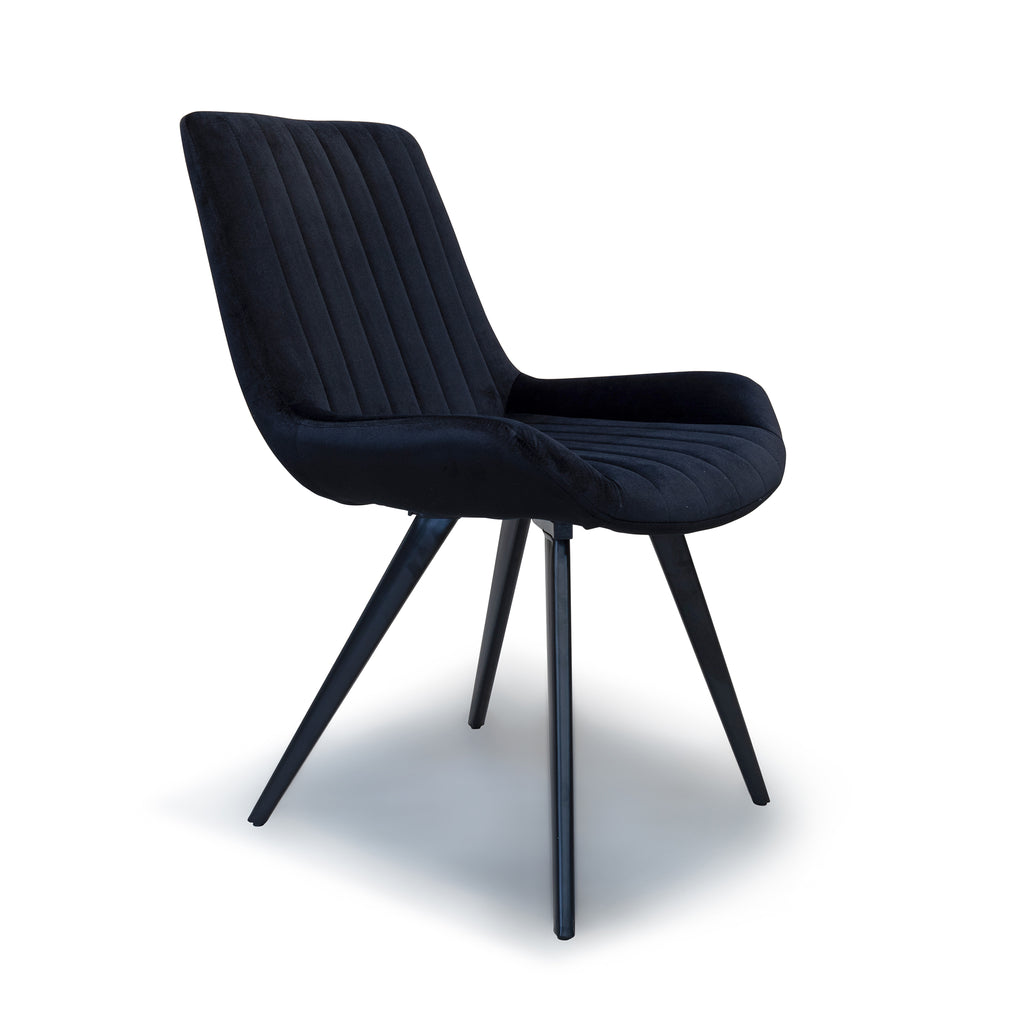 The Lucca Dining Chair - Onyx Velvet available to purchase from Warehouse Furniture Clearance at our next sale event.