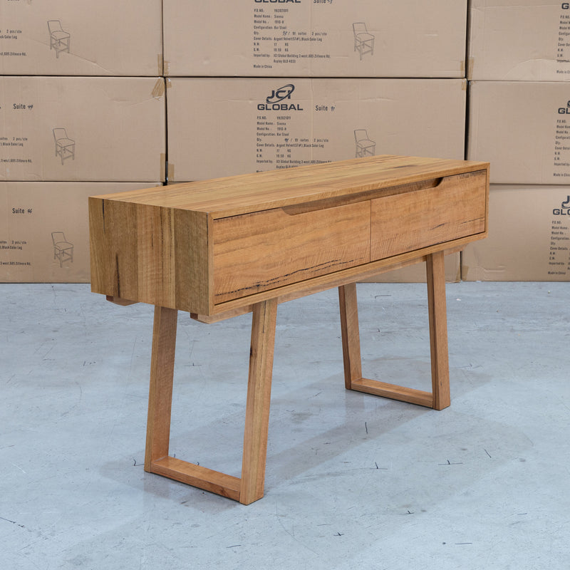 The Tucson Marri Hardwood Two Drawer Hall Table available to purchase from Warehouse Furniture Clearance at our next sale event.