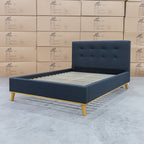 The Milos Queen Upholstered Bed - Charcoal available to purchase from Warehouse Furniture Clearance at our next sale event.