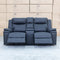 The Dylan Two Seater Triple Motor Electric Recliner Lounge - Jet available to purchase from Warehouse Furniture Clearance at our next sale event.