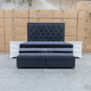 The Nora King Fabric Storage Bed - Charcoal available to purchase from Warehouse Furniture Clearance at our next sale event.