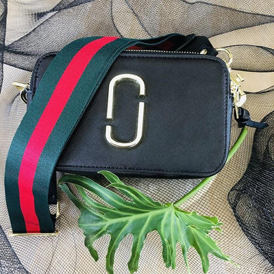 The Green & Red Stripe - Bag Strap - Silver Hardware available to purchase from Warehouse Furniture Clearance at our next sale event.