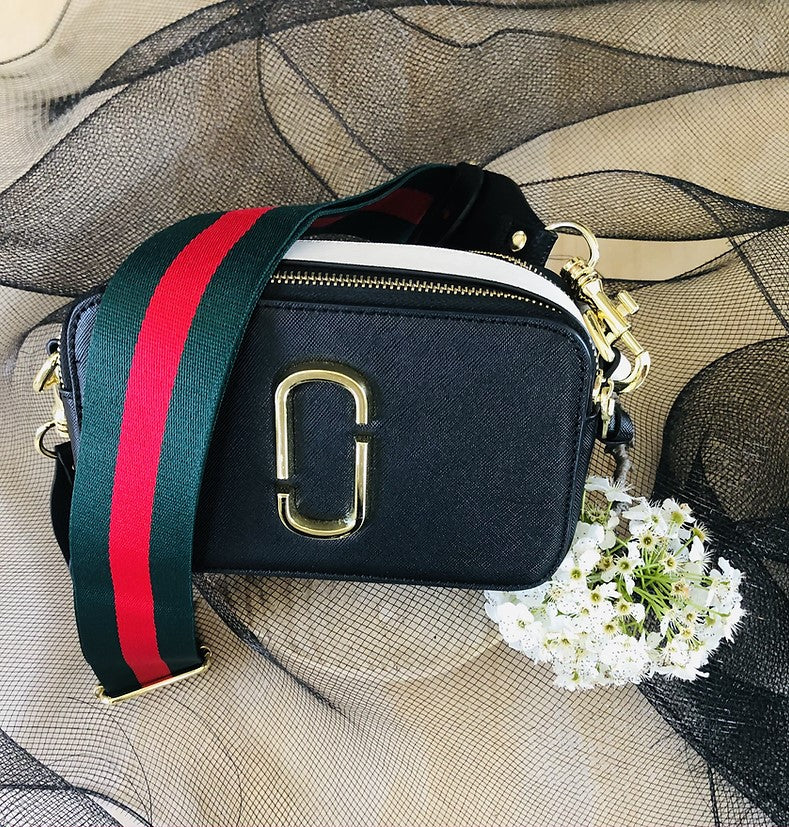 The Green & Red Stripe - Bag Strap - Gold Hardware available to purchase from Warehouse Furniture Clearance at our next sale event.