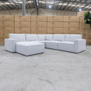 The Layne Modular Corner Lounge with Ottoman - Silver available to purchase from Warehouse Furniture Clearance at our next sale event.