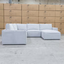 The Layne Modular Corner Lounge with Ottoman - Silver available to purchase from Warehouse Furniture Clearance at our next sale event.