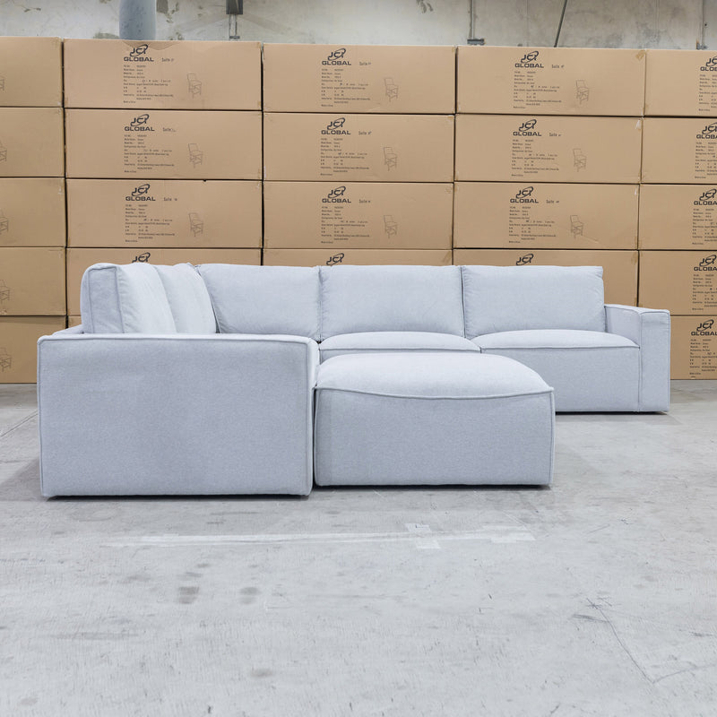 The Layne Modular Corner Lounge with Ottoman - Silver available to purchase from Warehouse Furniture Clearance at our next sale event.