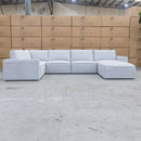 The Layne Modular Corner Lounge with Ottoman - Silver available to purchase from Warehouse Furniture Clearance at our next sale event.