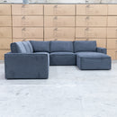 The Layne Modular Corner Lounge with Ottoman - Charcoal available to purchase from Warehouse Furniture Clearance at our next sale event.