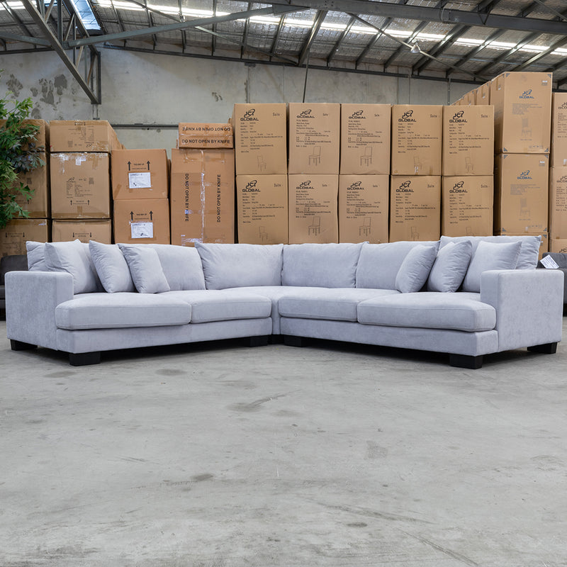 The Adelina Deep Seated Corner Lounge - Mist available to purchase from Warehouse Furniture Clearance at our next sale event.