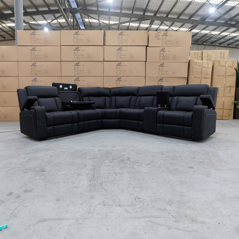 The Remi Dual Electric Modular Corner Recliner Lounge - Jet available to purchase from Warehouse Furniture Clearance at our next sale event.