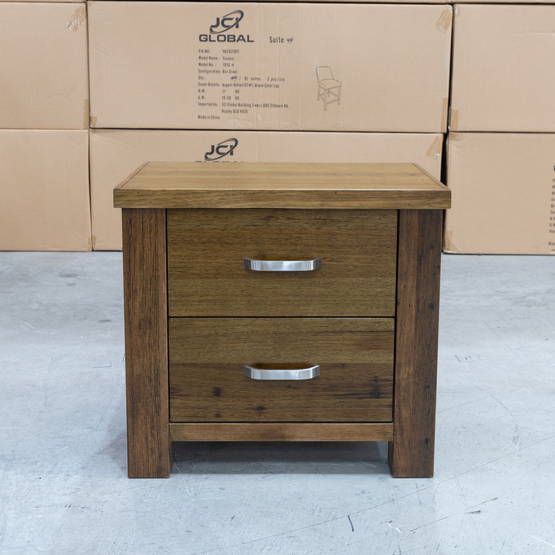 The Pioneer Wormy Chestnut Hardwood 2 Drawer Bedside Table available to purchase from Warehouse Furniture Clearance at our next sale event.
