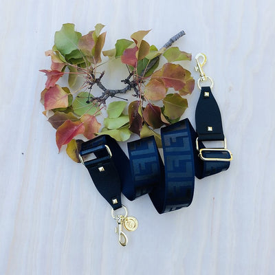 The Navy F - Bag Strap - Gold Hardware available to purchase from Warehouse Furniture Clearance at our next sale event.