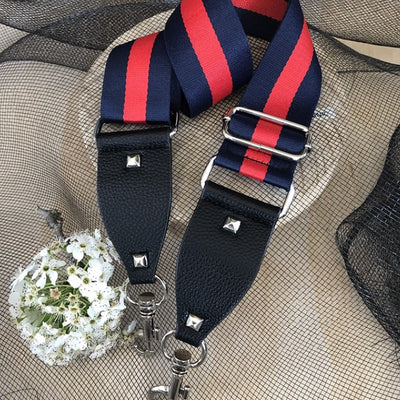The Navy & Red Stripe - Bag Strap - Silver Hardware available to purchase from Warehouse Furniture Clearance at our next sale event.