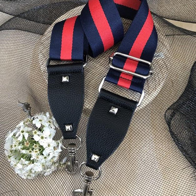 The Navy & Red Stripe - Bag Strap - Gold Hardware available to purchase from Warehouse Furniture Clearance at our next sale event.