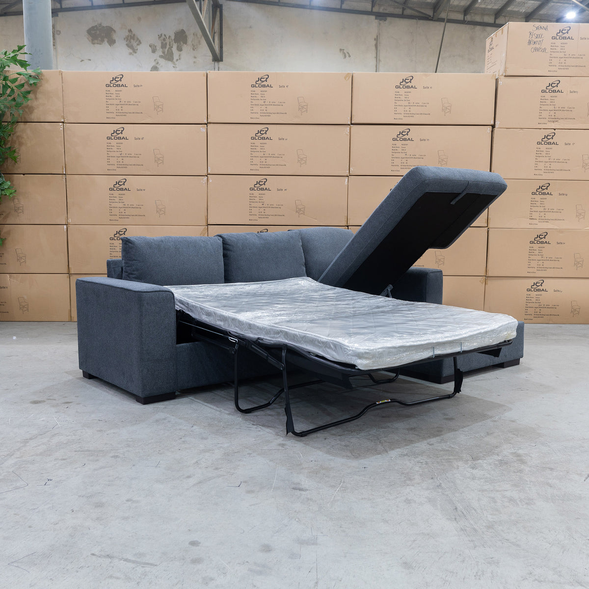 The Oakland Sofa Bed with RHF Storage Chaise - Charcoal available to purchase from Warehouse Furniture Clearance at our next sale event.